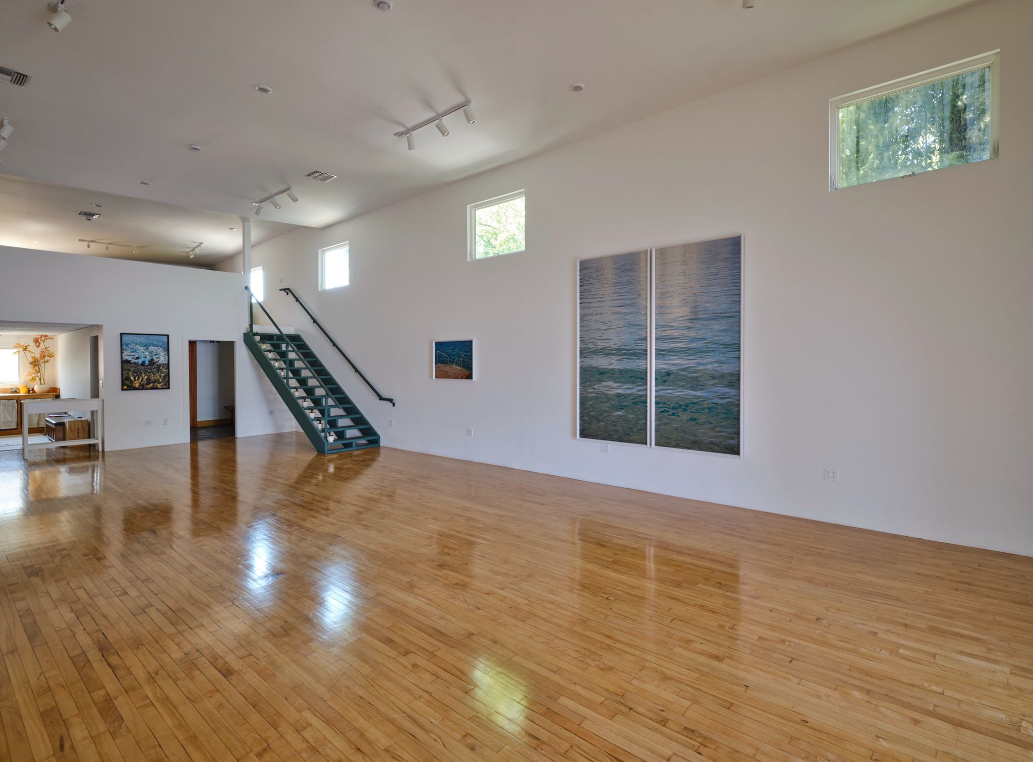 The main room at Interval Gallery, looking toward the stair